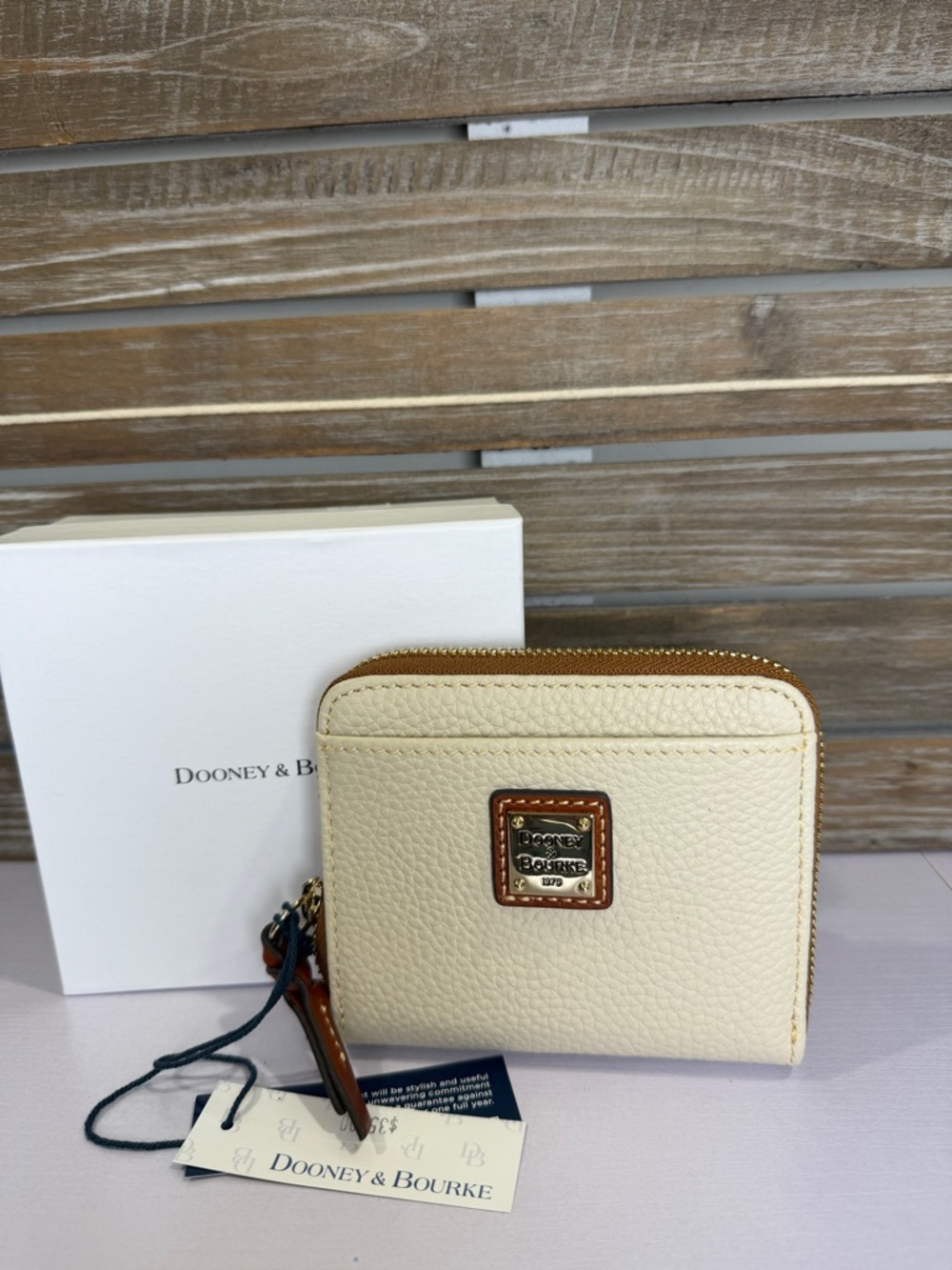 Dooney and Bourke Pebble Wallet zip around wallet bone nwt box